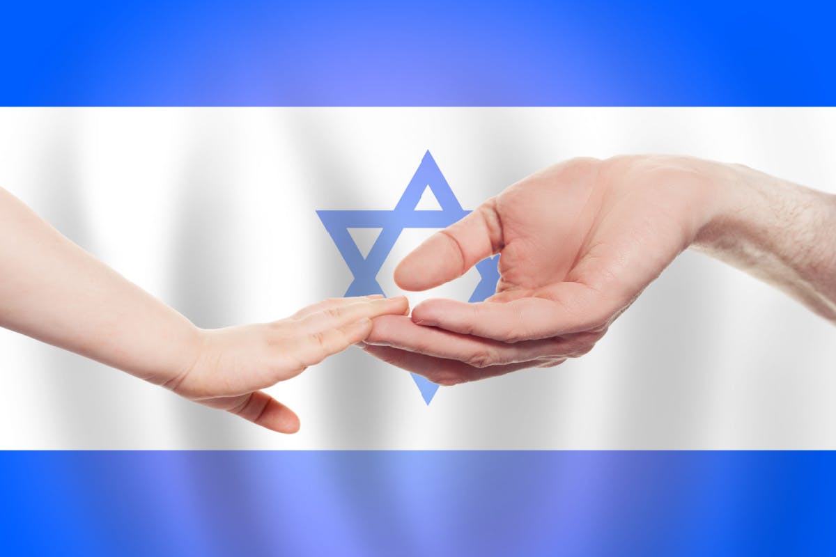 イスラエル国旗と取り合う手